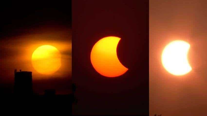 Surya Grahan: कोलकाता, लखनऊ समेत देश के कई हिस्सों में दिखा सूर्यग्रहण,  यहां देखें सूर्यग्रहण की खूबसूरत तस्वीरें | Zee Business Hindi