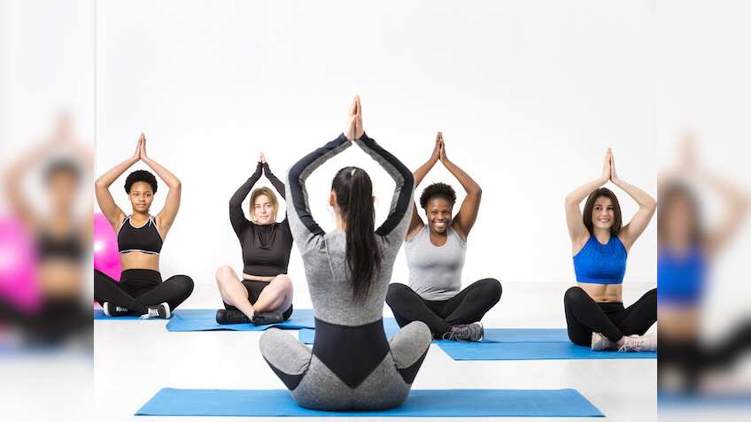 International Day Yoga: जानिए घर बैठे-बैठे कैसे शुरू करें योगा बिजनेस, हर महीने कमाएं लाखों रुपये