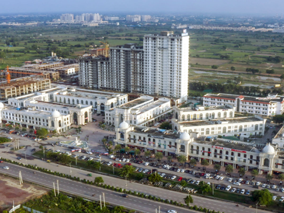 गुरुग्राम को टक्कर देने आया ये इलाका, जेवर एयरपोर्ट से प्रॉपर्टी रेट का रॉकेट होना तय! होगी पैसों की बारिश!