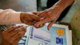 government considerig to link aadhaar with electoral rolls online voting for indians in abroad