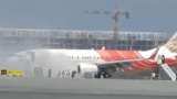 Air India Express plane shows smoke at Muscat airport 141 passenger evacuated from AI Express flight