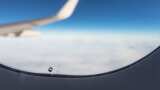 why aeroplane windows glass have tiny holes air pressure maintain balance for passenger safety know important role