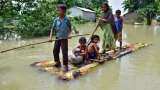 Assam Flood amit shah speaks to CM himanta biswa sarma Flood situation marginally improves 4 lakh people still affected