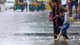 Weather Update Delhi Heavy rain IMD issues red alert for 7 districts over 48 hours see latest update