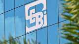SEBI fined 2.46 corers 7 individuals and 2 companies barred for 18 months unfair trade practice
