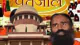 patanjali misleading ads case baba ramdev and acharya balkrishna apolozise with folded hands in supreme court