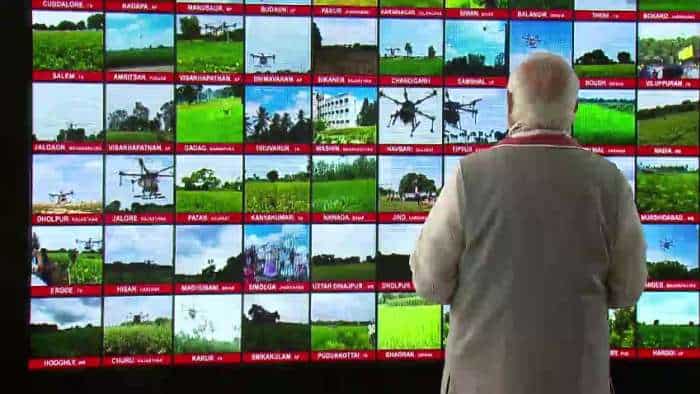 PM narendra modi flags of 100 kisan drones to spray pesticides in farms across country