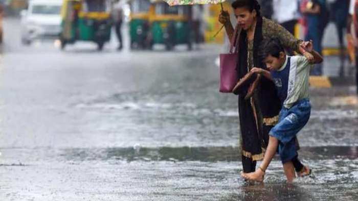 Weather Update Delhi Heavy rain IMD issues red alert for 7 districts over 48 hours see latest update