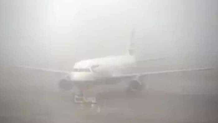 Delhi Airport Flight Delayed cancelled due to intense fog aviation minister Jyotiraditya Scindia dgca directions to gmr