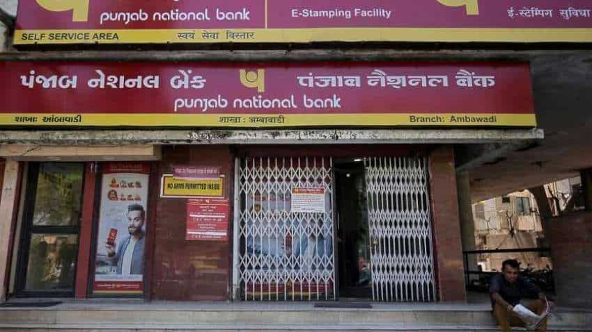 PNB Doorstep Banking: अब पैसे निकालने के लिए बैंक या ATM जाने की जरूरत नहीं, बैंक घर पर दे जाएगा कैश