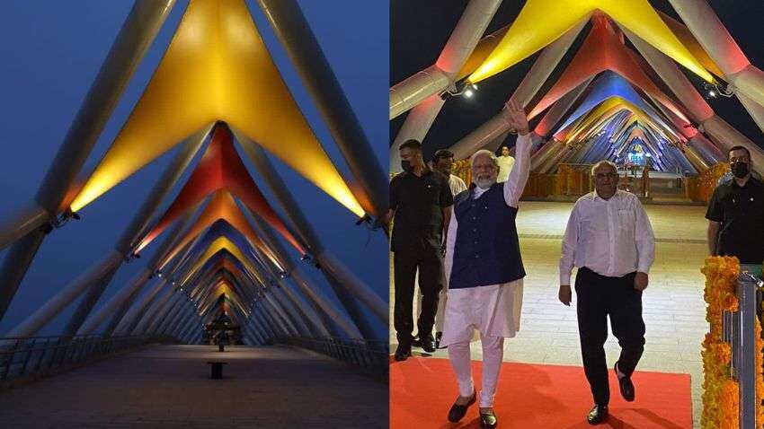 Atal Bridge: पीएम मोदी ने अटल ब्रिज का किया उद्घाटन, साबरमती फ्रंट पर बने ब्रिज का देखिए खूबसूरत नजारा