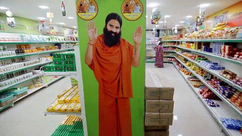 Patanjali Foods FPO: अगले महीने आ सकता है बाबा रामदेव की कंपनी का एफपीओ, क्या है प्रमोटर्स की हिस्सेदारी का मामला?