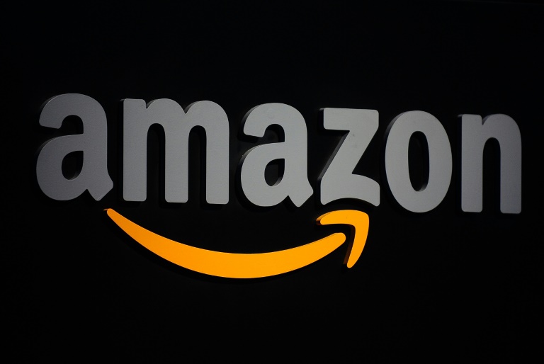 Amazon delivers profit, stock surges 12%