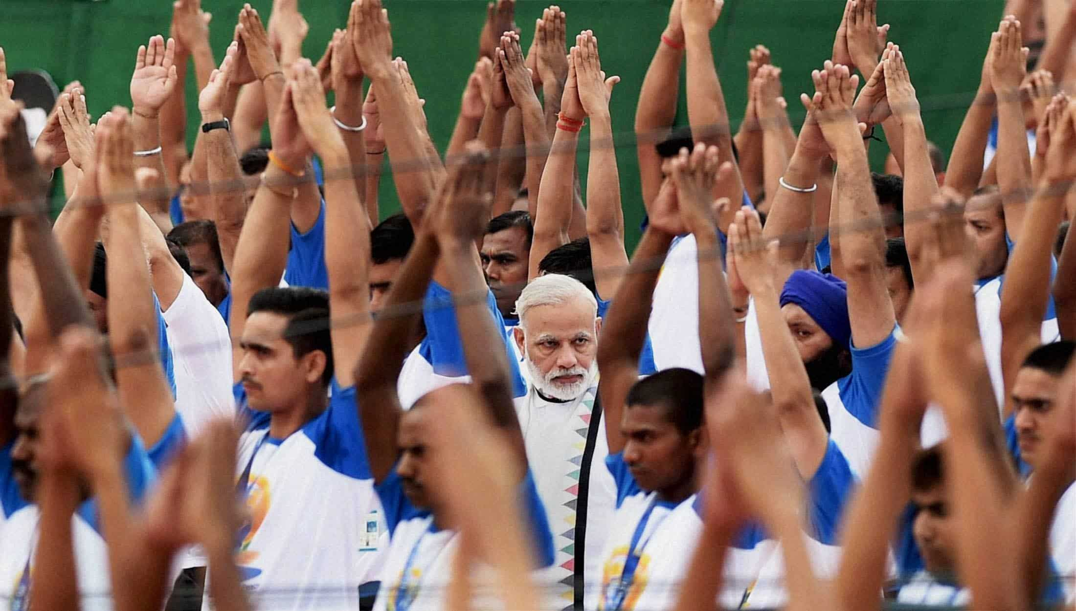 PM Modi spotted among thousand yoga practitioners in Capitol Complex, Chandigarh. PTI