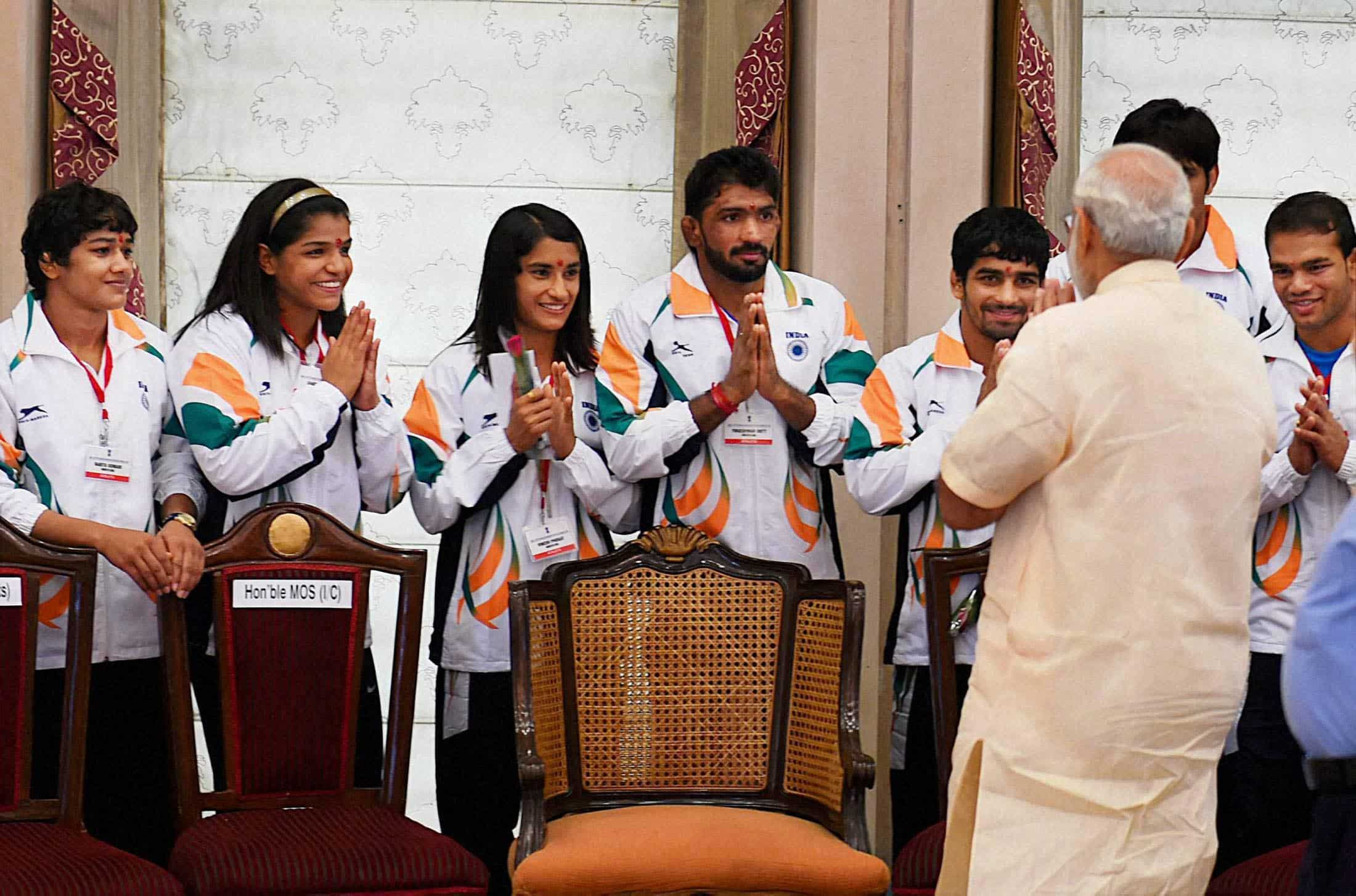 Prime Minister Narendra Modi meets the athletes and sportspersons in New Delhi. PTI