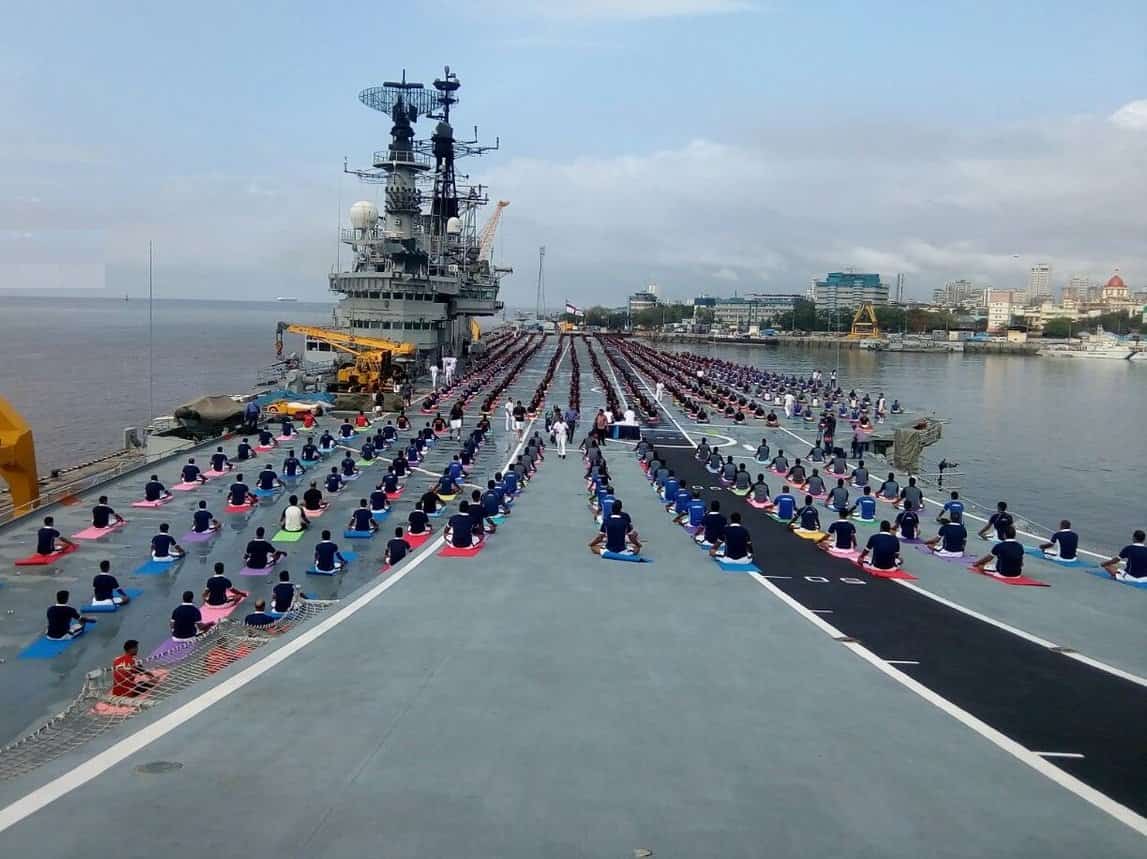 Navy personnel are seen doing yoga onboard the Viraat on Yoga Day. Twitter/MoD
