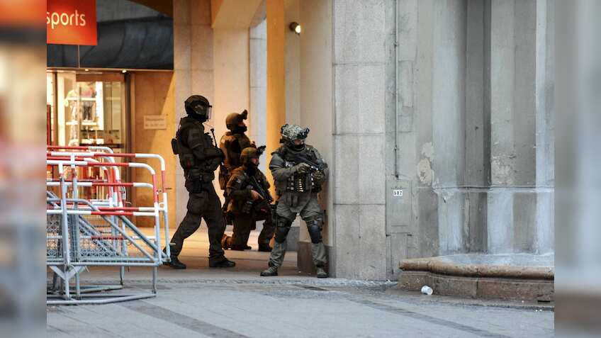 Munich attack: German-Iranian gunman kills at least nine in shopping mall