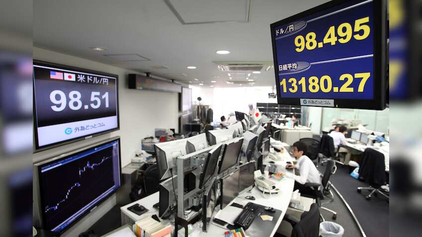 Nikkei slides as Bank of Japan disappoints markets; yen gains