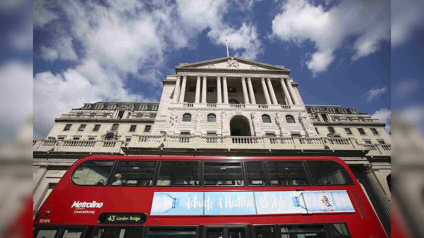 Bank of England cuts rates for first time since 2009, restarts bond purchases