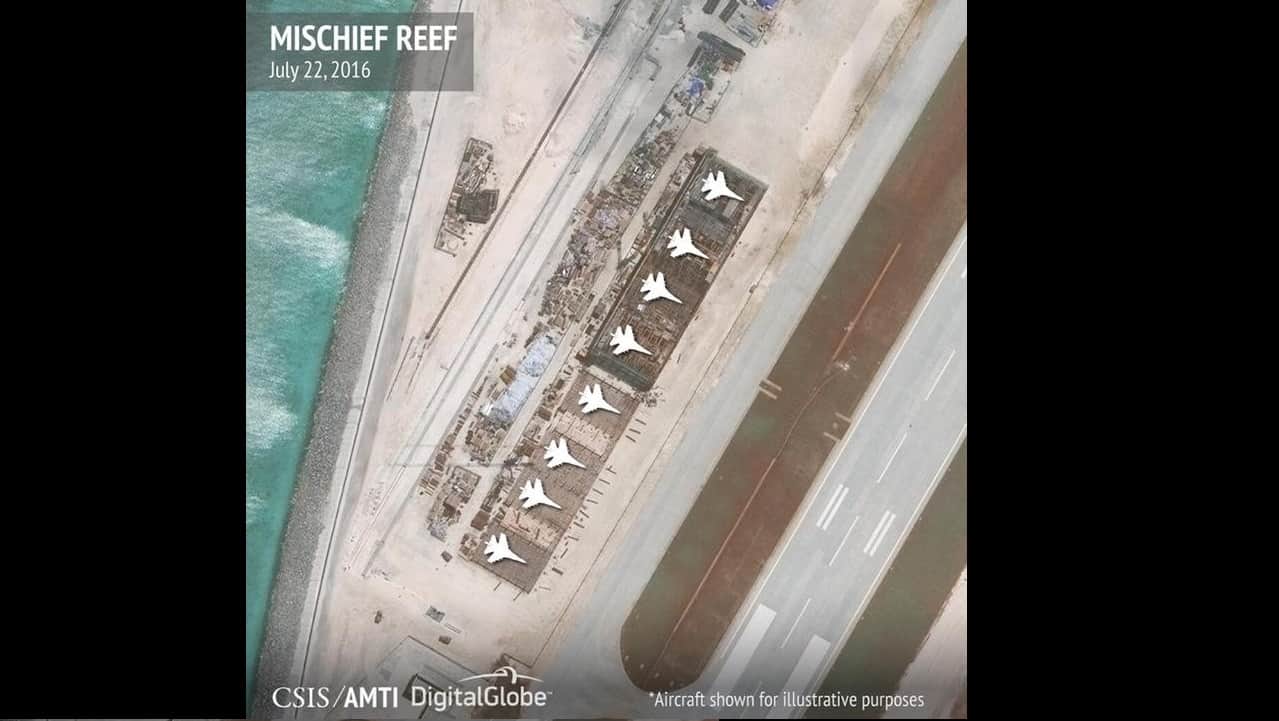 Satellite image by CSIS shows aircraft hangars on Mischief Reef in the Spratly islands, in the disputed South China Sea. Reuters