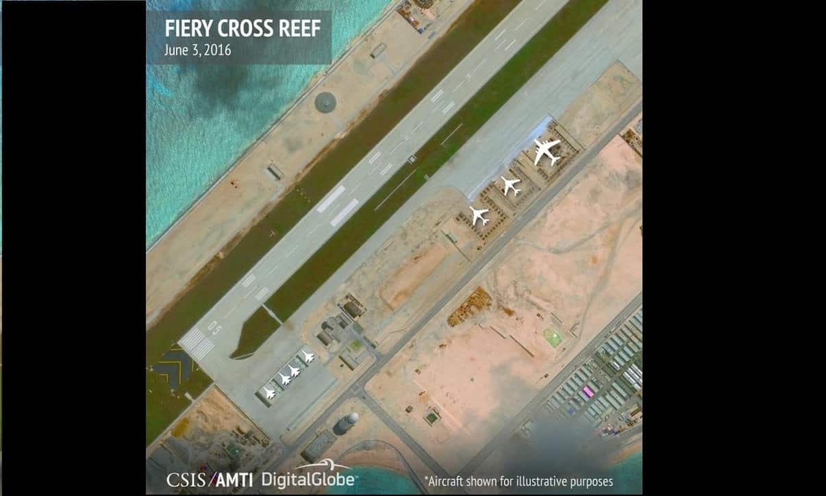 Satellite image by CSIS shows aircraft hangars on Fiery Cross Reef in the Spratly islands, in the disputed South China Sea