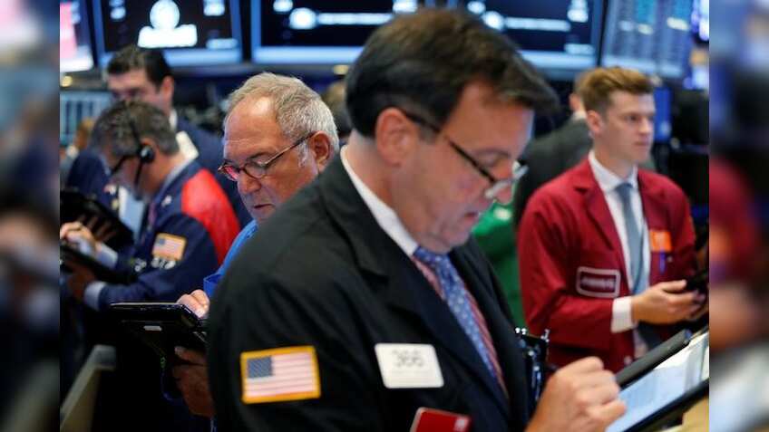 Wall Street opens flat as Feds divided on rates