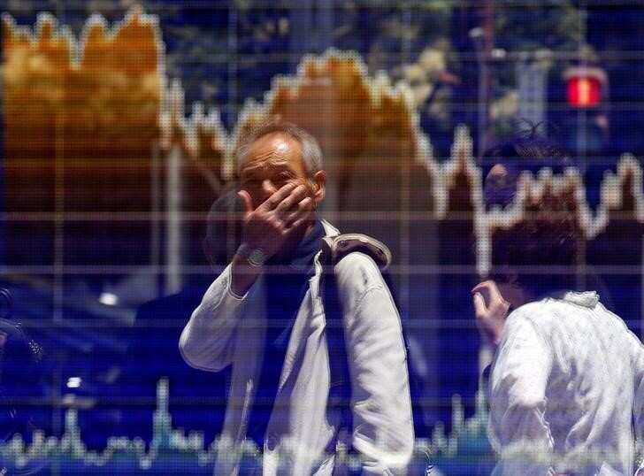 Asian stocks edge up, dollar dips as markets await Fed clues