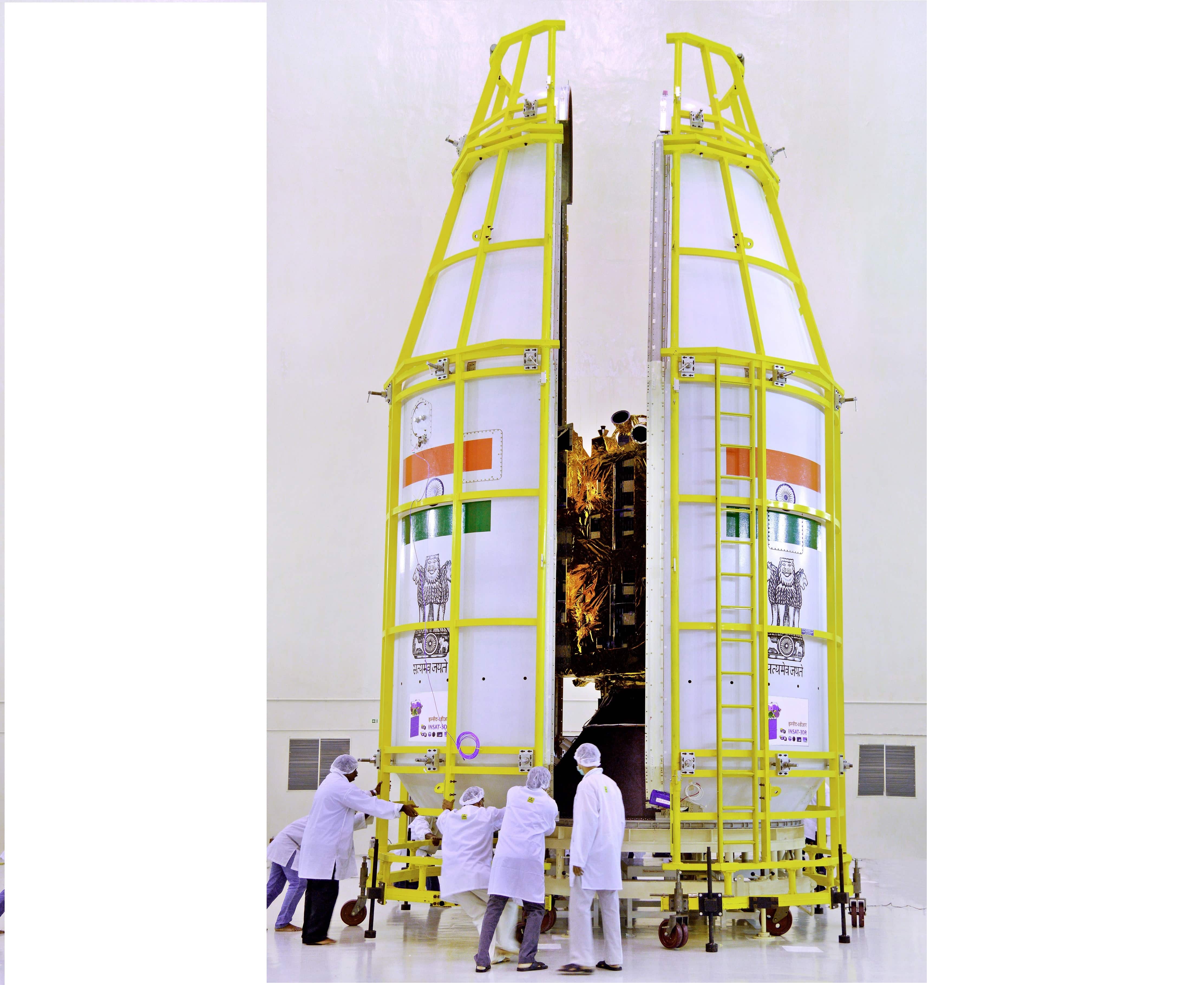 Two halves of GSLV-F05 payload fairing enclosing INSAT-3DR being closed. Photo: Official website
