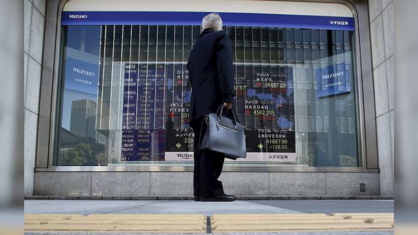 Asian shares gain as crude oil surge improves risk appetite