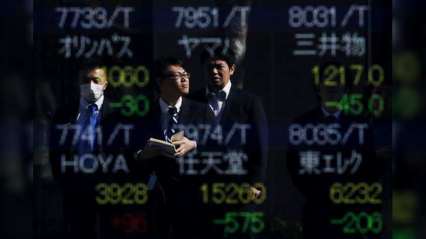 Asian shares wobble, dollar firms after upbeat U.S. data