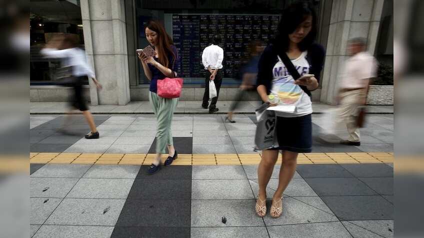 Asia shares, Mexican peso gains as Trump's chances seen diminishing