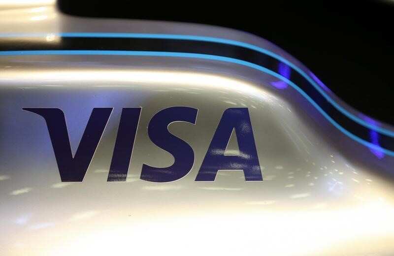 Visa CEO Charles Scharf to resign, ex-AmEx president to take over
