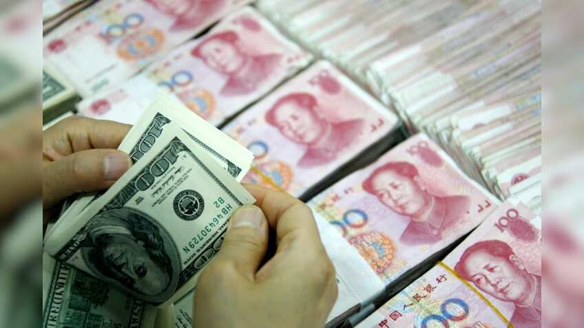 China weakens yuan-dollar rate beyond landmark 6.8 level