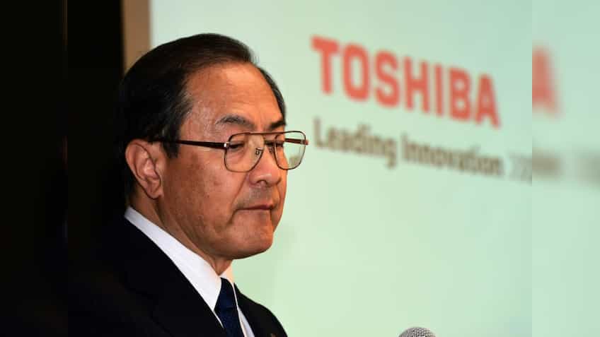 Toshiba first-half profit triples on asset sales