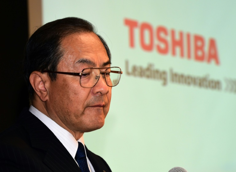 Toshiba first-half profit triples on asset sales