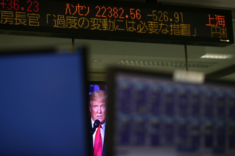 Asian markets hit by Trump fears, weak yen lifts Tokyo