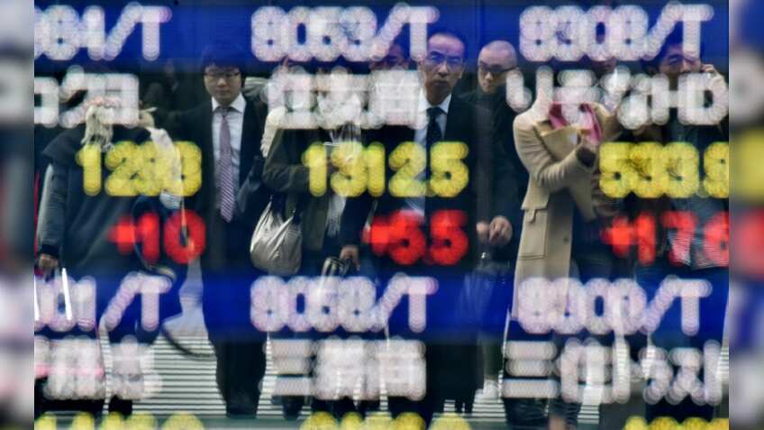 Oil prices fall further in Asia, yen gains hit Tokyo