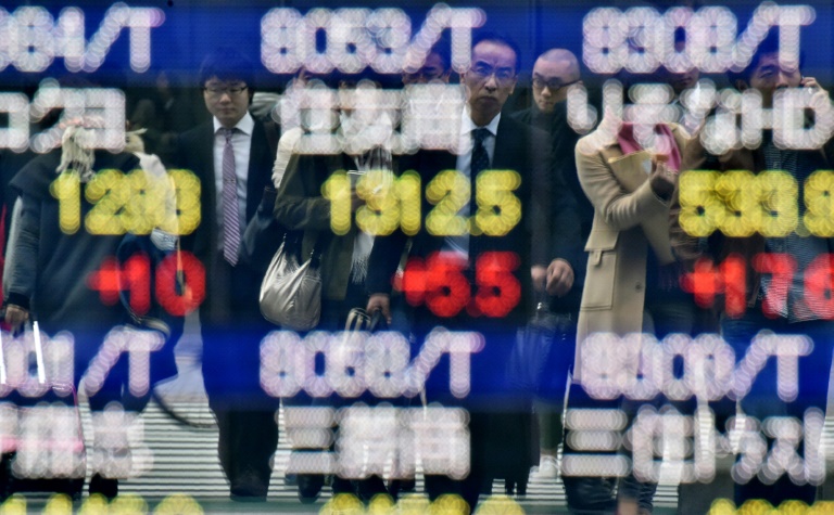 Oil prices fall further in Asia, yen gains hit Tokyo