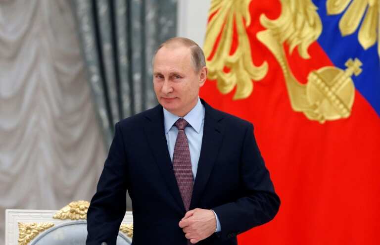 Putin, Iran's Rouhani back OPEC bid to stabilise oil prices