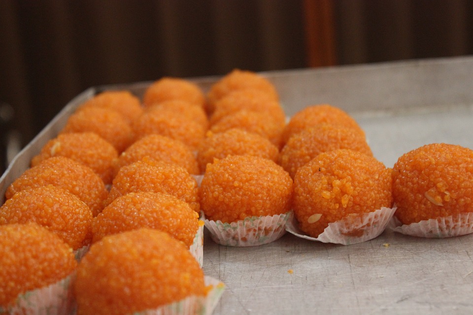 Stand in line at ATMs get a laddoo from BJP govt
