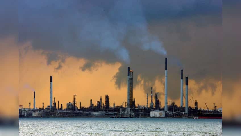 Oil prices fall after Fed hike, but tighter market looms
