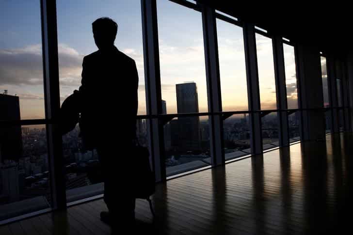 Economy pays tab for Japan Inc's free lunch on overtime