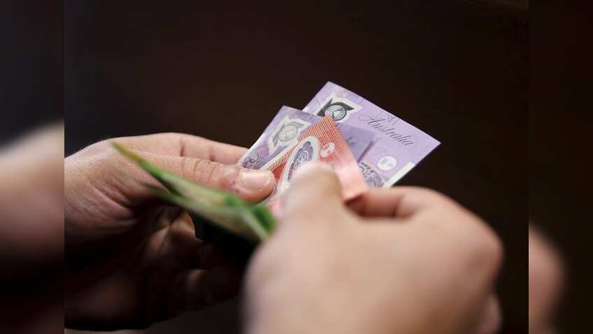 Australia's budget drips with red ink, top credit rating at risk