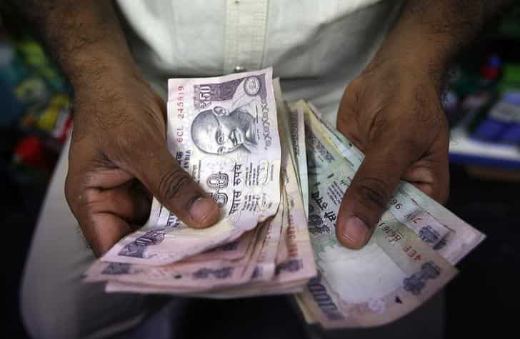 Rupee edges higher by 3 paise against dollar in early trade