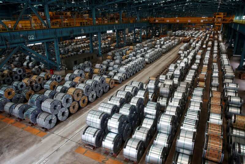 Growth in China's factories, services slows in December 