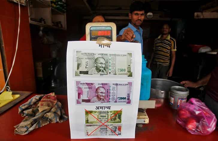 Rupee to fall to Rs 69.50 against dollar value over coming year: Reuters poll