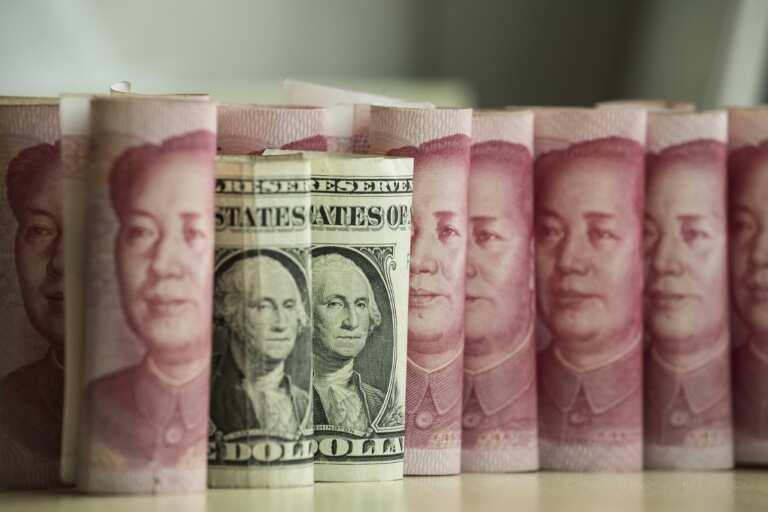 China weakens yuan following last week's jump