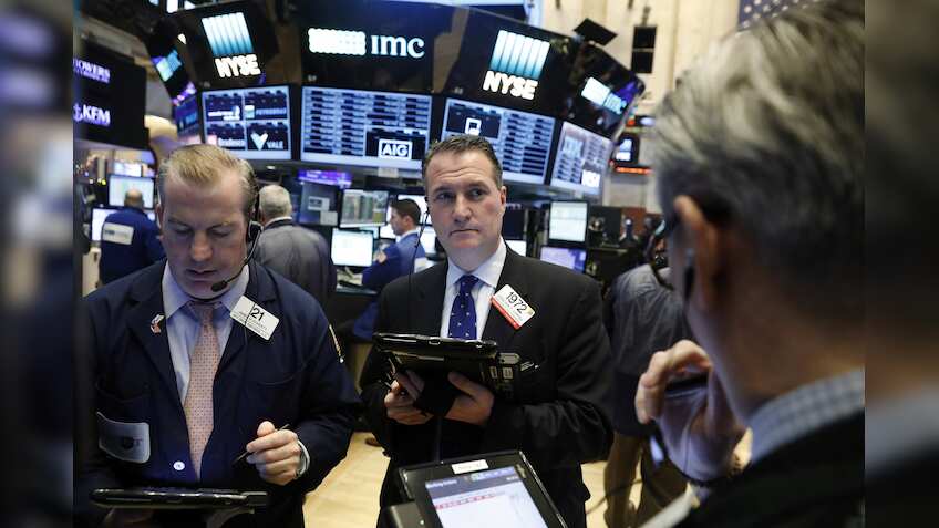 Global stocks rise as commodities rally; dollar falls vs yen