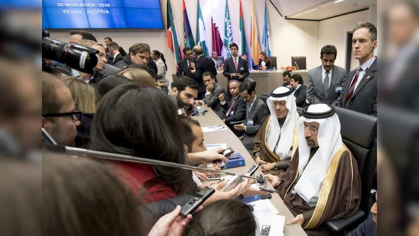 OPEC oil output inches down after November deal