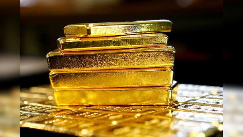 Gold rises to two-month high on Trump policy uncertainty, dollar drop